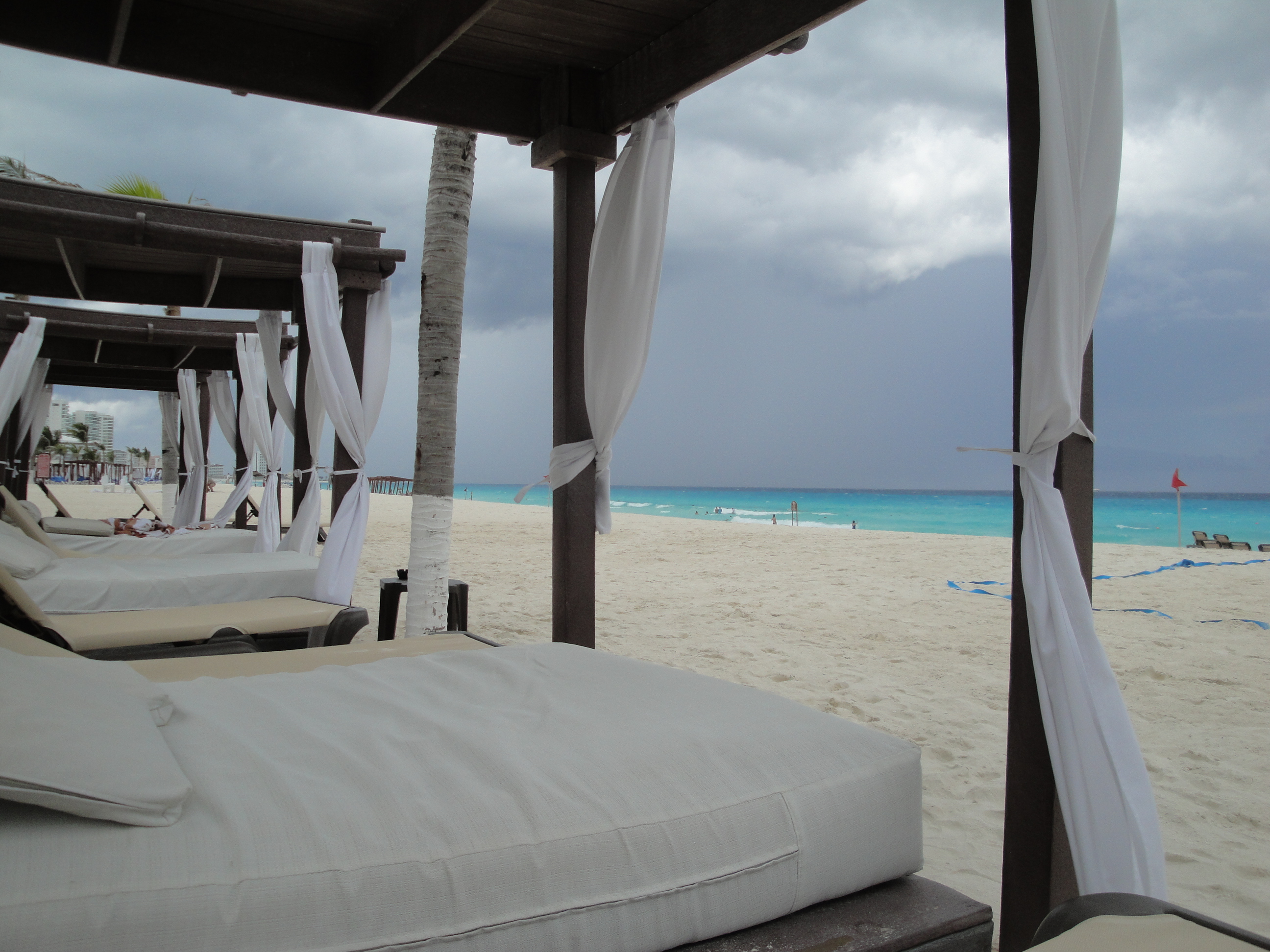 Daybeds on the beach at The Royal in Cancun Resort - Cancun, Mexico